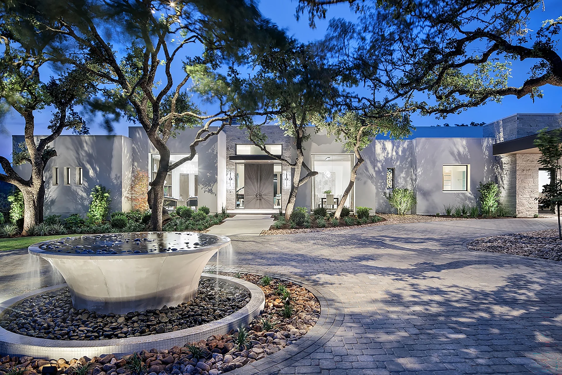 Nature's Retreat — front entry and fountain at night